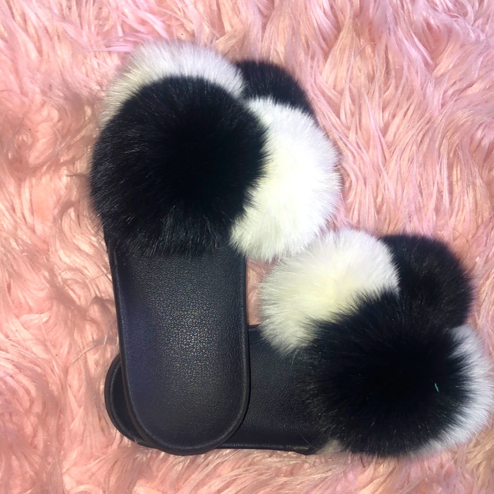 Size 10 black and white women’s furry slides!!
